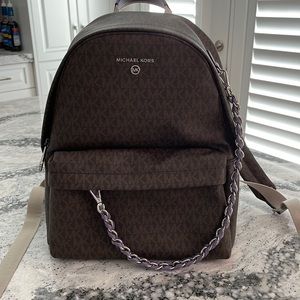 84. BNWOT Michael Kors backpack